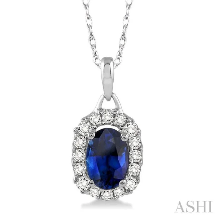 6x4 MM Oval Cut Sapphire and 1/6 Ctw Round Cut Diamond Pendant in 14K White Gold with Chain