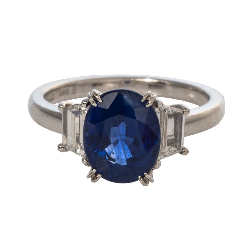 3.43ct Oval Sapphire & Trapezoid Diamond Three-Stone Platinum Ring