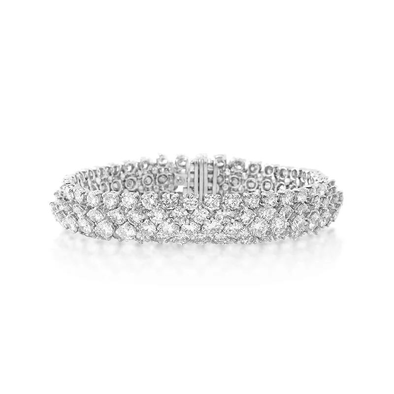 London 1950s Platinum Diamond Bombé Bracelet